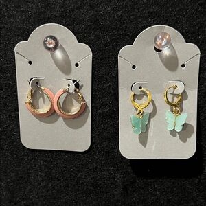 Two sets. Gold and Pink Hoop Earrings and Blue Butterfly Earrings